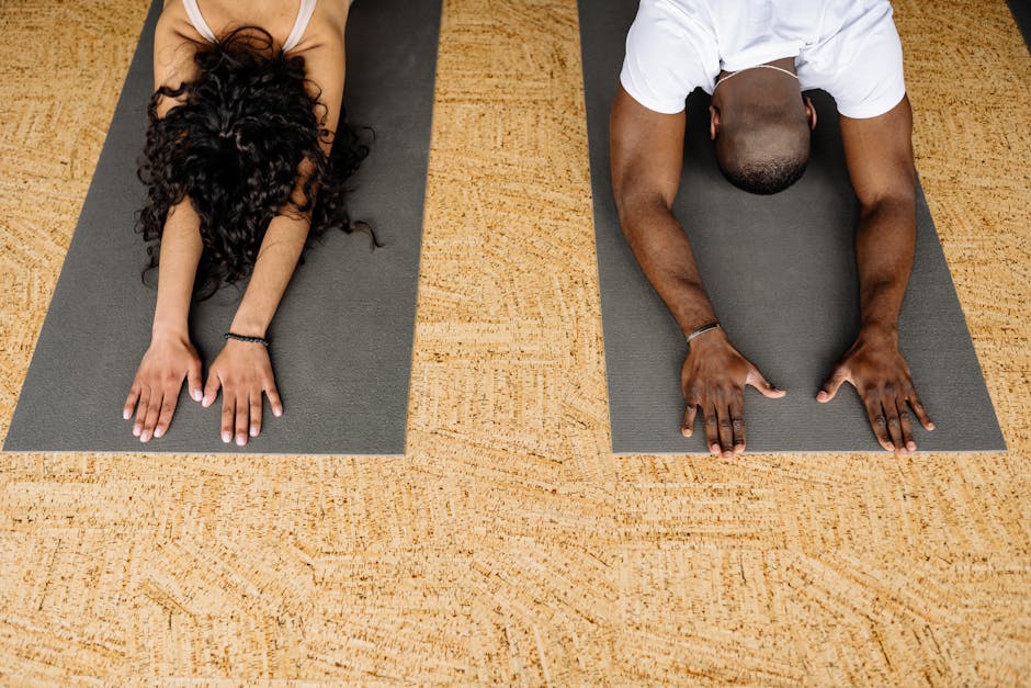 Experienced yoga instructor guiding personalized meditation and asana practice in serene studio environment